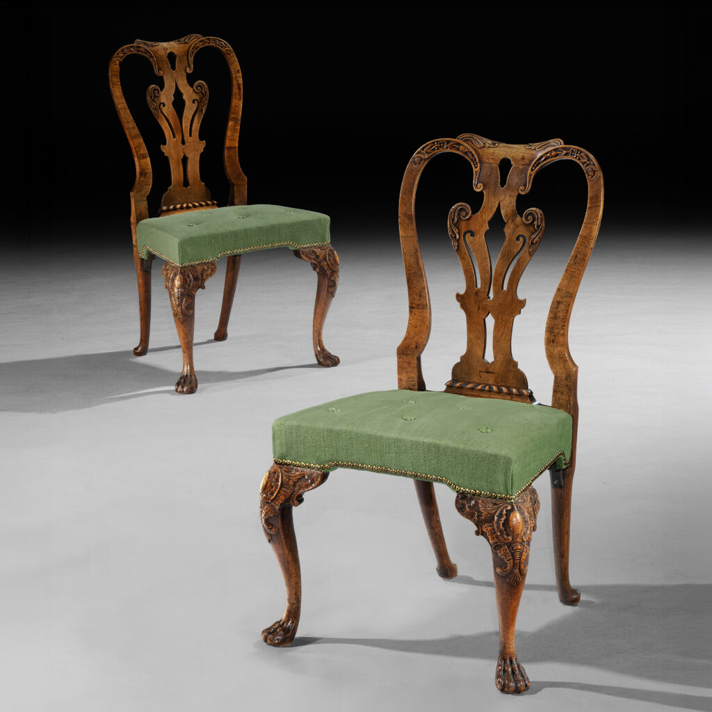 A Fine Pair Of George II Carved Walnut Side Chairs