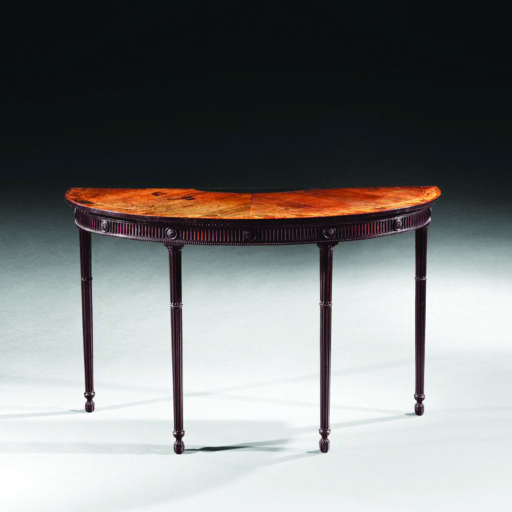 A George III demi lune mahogany and rosewood side table