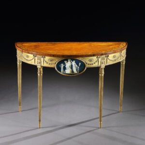 A George III Satinwood Marquetry Giltwood and Composition Demi-Lune Side Table